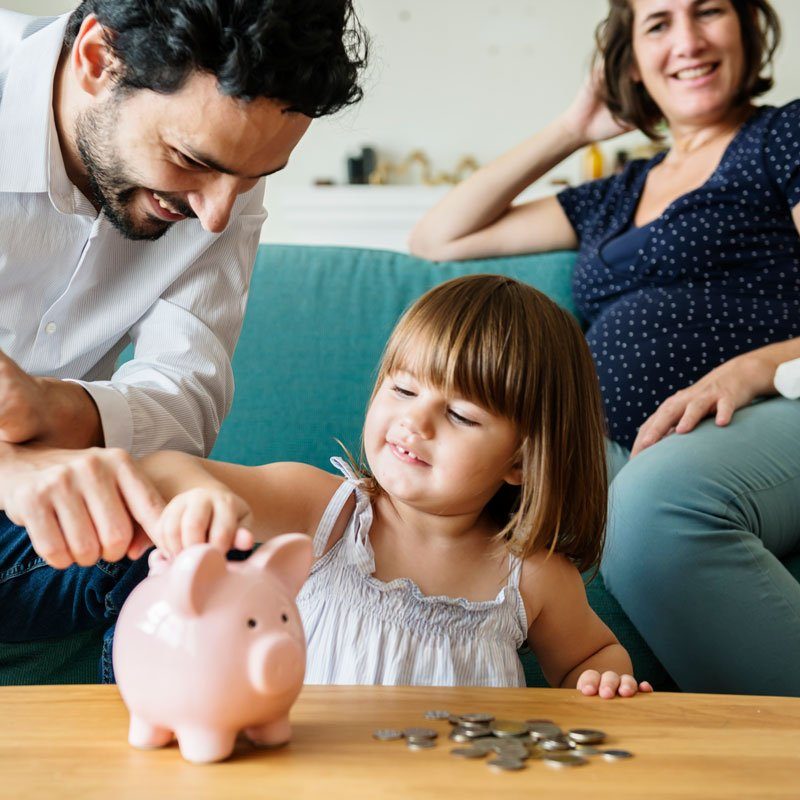 family-saving-money-in-piggy-bank-2021-08-26-23-57-02-utc